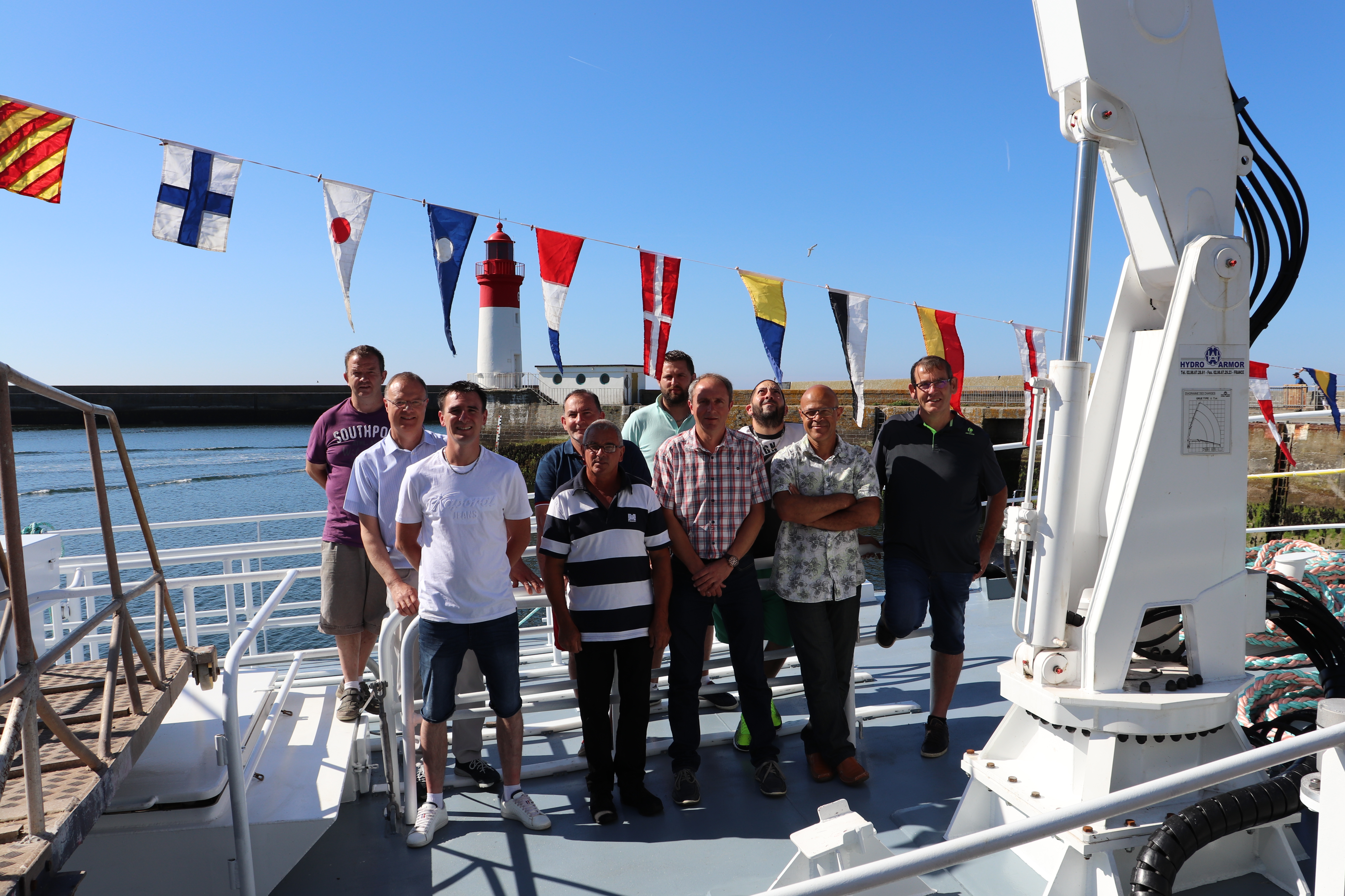 The crew of the new trawler and Armement Bigouden staff on board Bara An Arvoriz
